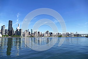 New York City Skyline, East River and Manhattan, New York waterfront with Queensboro Bridge in background