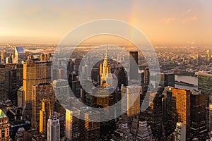 New York City skyline with Manhattan skyscrapers at dramatic stormy sunset, USA.