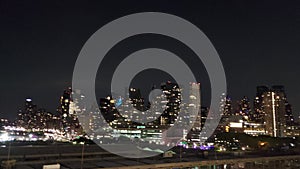 New York City Skyline at Night with Illuminated Skyscrapers