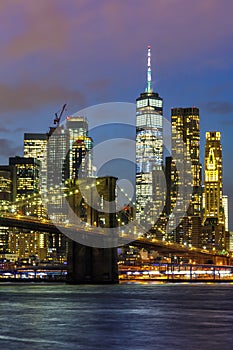 New York City skyline night Manhattan town Brooklyn Bridge World Trade Center portrait format