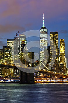 New York City skyline night Manhattan town Brooklyn Bridge World Trade Center portrait format photo
