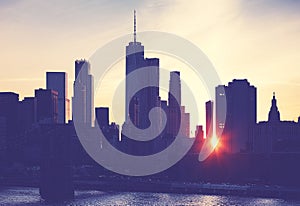 New York City skyline silhouette at sunset, USA.