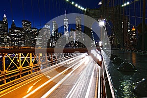 New York City skyline view from the Brooklyn Bridge at night, Manhattan buildings and skyscrapers