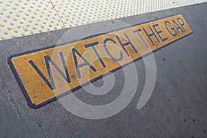 NEW York CITY subway platform floor sign watch the gap