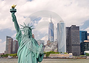 New York City tourism concept. Statue of Liberty with Lower Manhattan skyline