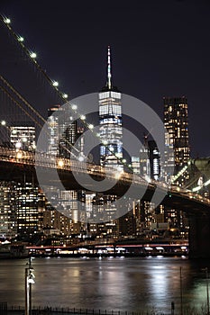 New York City empty streets. NYC skyline with Brooklyn bridge at night