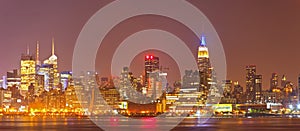 New York City, USA colorful night skyline panorama