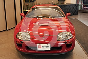 New York City, USA - July 23, 2023: toyota supra 1994 sports car red color, front view