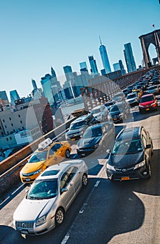 New York City, USA - March 19, 2017 : Afternoon rush hour traffic on the Brooklyn Bridge vehicle road