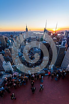 New York City - USA. View to Lower Manhattan downtown skyline with famous Empire State Building and skyscrapers at sunset