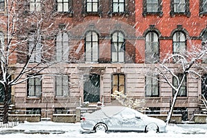 New York City winter street scene with snow covered sidewalks