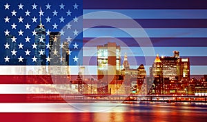 New York City& x27;s Brooklyn Bridge and Manhattan skyline illuminated American flag