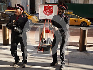 Salvation Army soldiers perform for collections in midtown Manhattan during holidays season