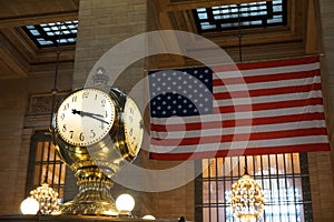 New York - The Grand Central Terminal Clock with flag