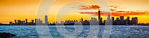 New York and Jersey City skylines at sunrise photo