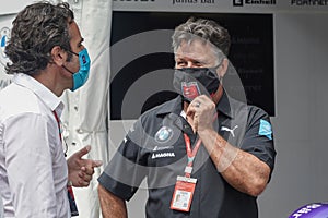 Michael Andretti, BMW i Andretti Motorsport Team owner, gives interview at pit line during 2021 New York City E-Prix in Brooklyn