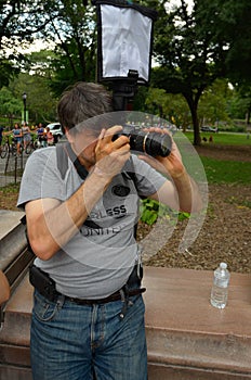 NEW YORK - JULY 26: Photographer shooting models during first official Body Painting Event