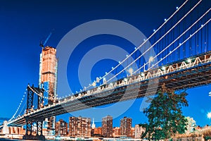 New York night view of the Lower Manhattan and the Manhattan Bridge across the East River