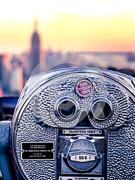 A coin operated telescope on Top of the Rock Observation Deck.