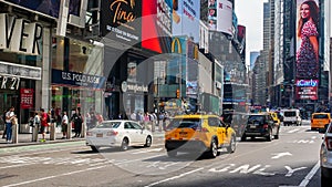 Busy Time Square in sunny spring day