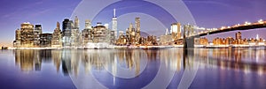 New York panorama with Brooklyn bridge at night, USA