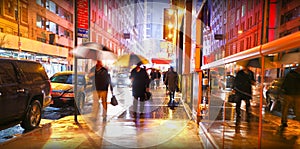 New York people commuting in rain photo