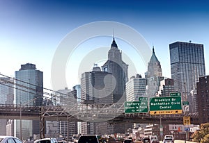 New York road signs and skyline on FDR drive, USA