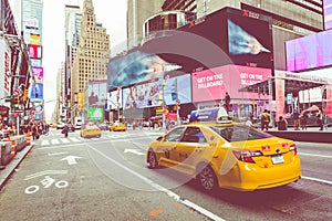 NEW YORK - SEPTEMBER 2, 2018: Yellow cab speeds through Times Sq