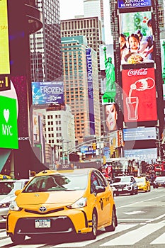 NEW YORK - SEPTEMBER 2, 2018: Yellow cab speeds through Times Sq