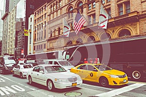 NEW YORK - SEPTEMBER 2, 2018: Yellow cab speeds through Times Sq