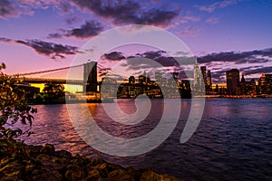 New York Skyline with Brooklyn Bridge Hudson River Manhatten Twi