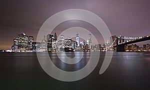 New York Skyline and Brooklyn Bridge by night