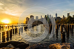 New York Skyline Cityscape Lower Manhatten World Trade Center Freedom Tower from Brooklyn Bridge Park Pier