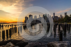 New York Skyline Cityscape Lower Manhatten World Trade Center Freedom Tower from Brooklyn Bridge Park Pier