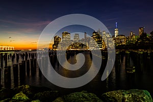 New York Skyline Cityscape Lower Manhatten World Trade Center Freedom Tower from Brooklyn Bridge Park Pier