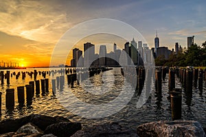 New York Skyline Cityscape Lower Manhatten World Trade Center Freedom Tower from Brooklyn Bridge Park Pier