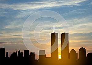 New York skyline silhouette with Twin Towers and against the sunset
