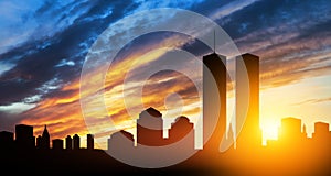 New York skyline silhouette with Twin Towers at sunset. American Patriot Day banner.