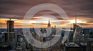 New York skyline from Top of the Rock Rockefeller center in USA at sunset blue hour