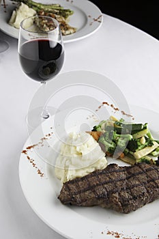 New York Strip Steak with Mashed Potatoes and Mixed Vegetables