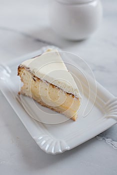 New York style cheesecake on white plate