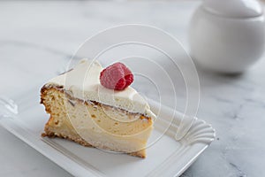 New York style cheesecake on white plate