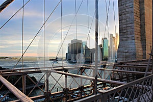 New York, United States - Brooklyn Bridge at sunset and lower Manhattan