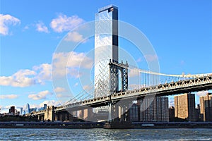 New York, United States - Manhattan Bridge at sunset seen from Brooklyn Bridge