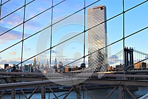 New York, United States - Manhattan Bridge at sunset seen from Brooklyn Bridge