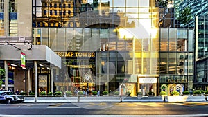 New York, USA December 10, 2023: The famous facade of the trump tower with its iconic gold clock, in the middle of the 5th avenue