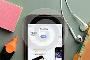 New York, USA - 1 December 2020: Passtime mobile app icon on phone screen top view, Illustrative Editorial