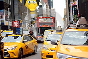 NEW YORK, USA - July 10, 2019:Yellow cabs in traffic on Times Square in Manhattan, New York, USA