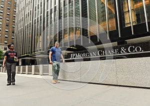 New York, USA - May 26, 2018: People walk near JPMorgan Chase &