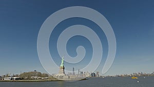 New York, USA Statue of Liberty with Manhattan background view.